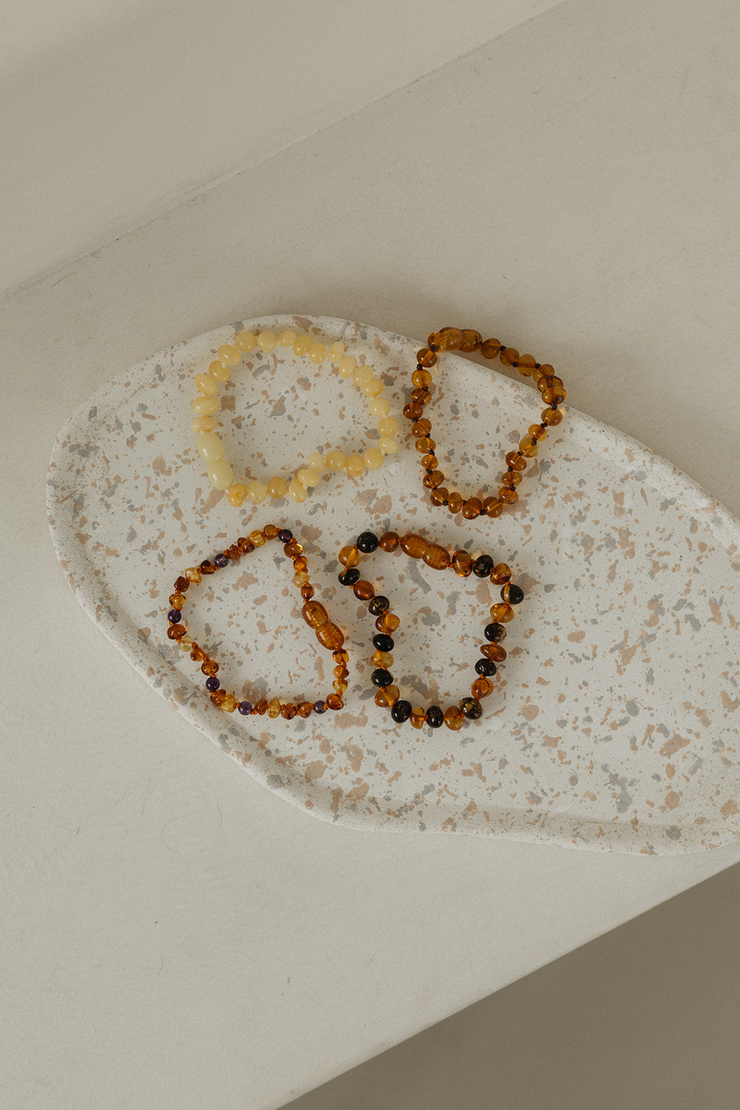 Coni barnsteen armband baby